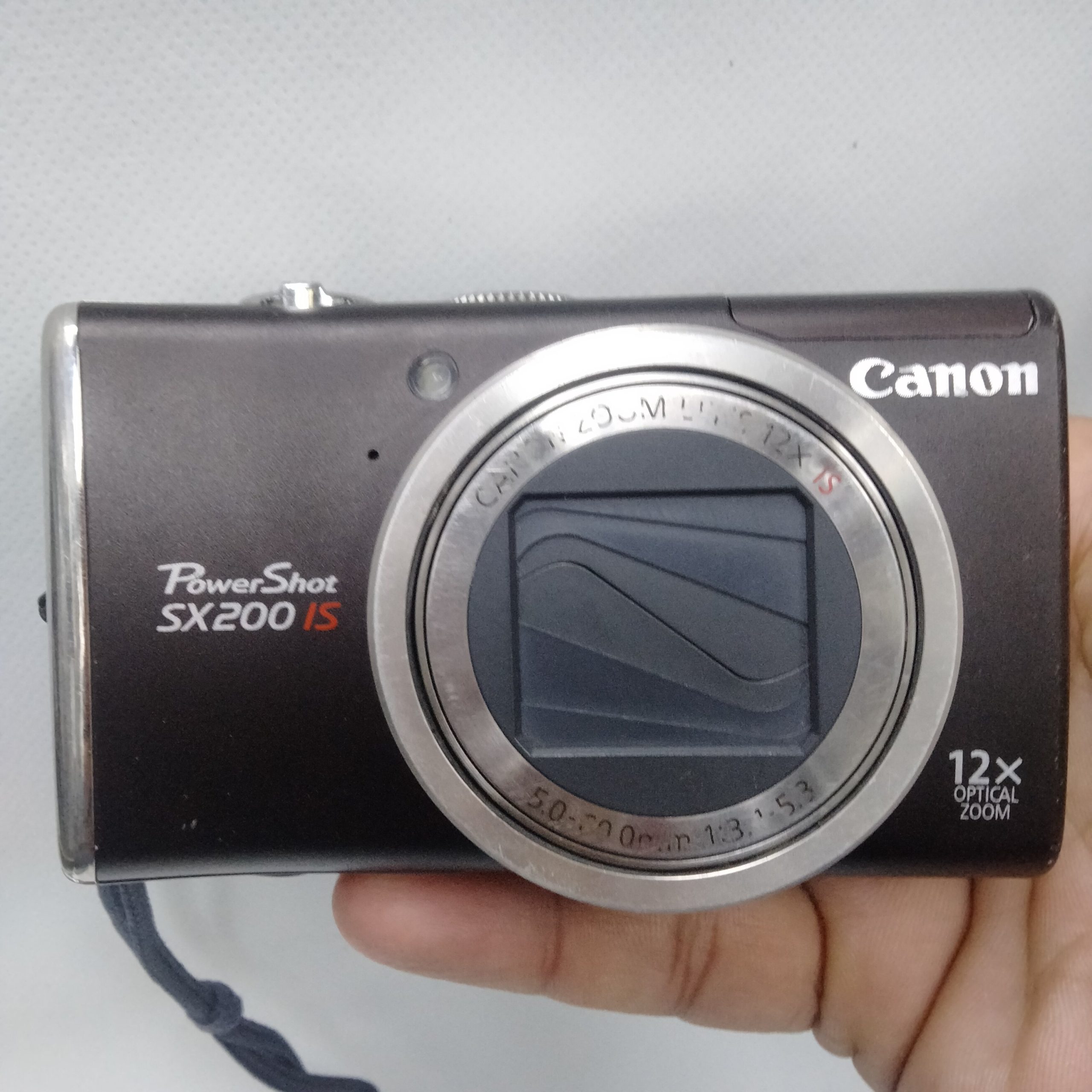 2026/10/1002681158-scaled.jpg Canon PowerShot SX-200IS (DARK BROWN) - Image 1